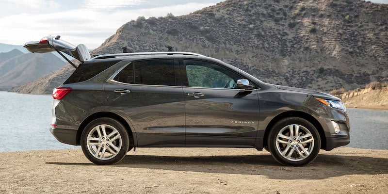 Blue 2021 Chevy Equinox driving