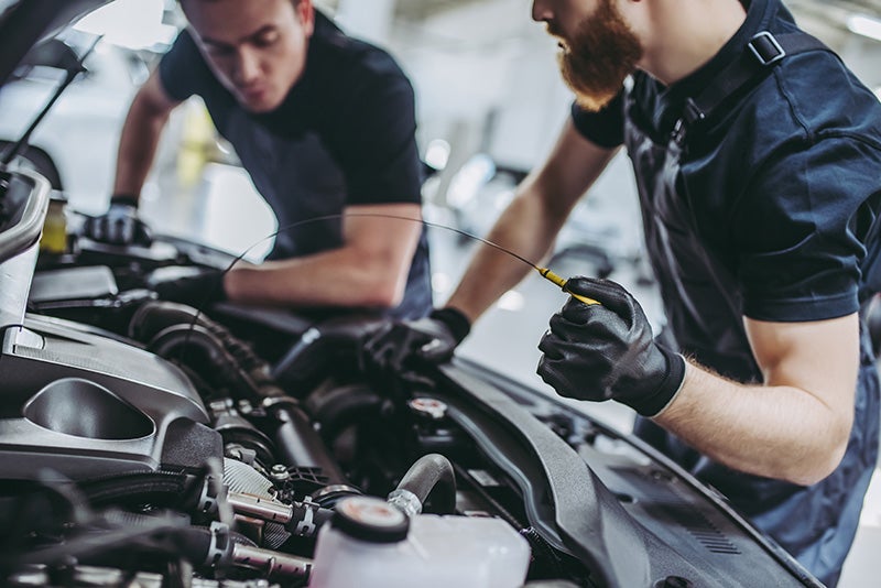 Mechanics working vehicles - Finnegan Buick GMC in Rosenberg TX